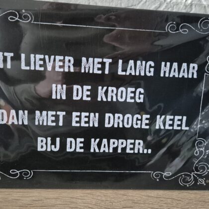 Zit liever met lang haar in de kroeg